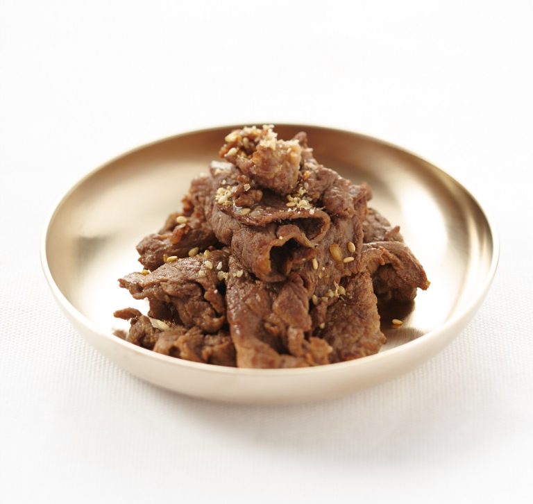 Beef bulgogi on a brass plate