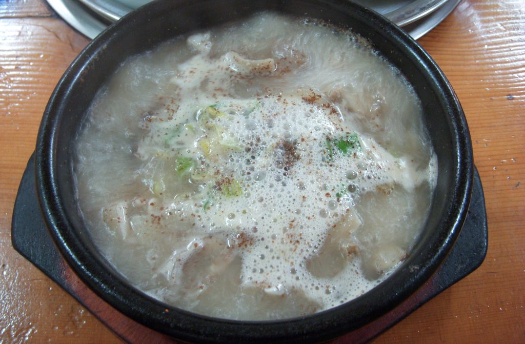 Dwaeji gukbap, Busan-style pork and rice soup, with side dishes