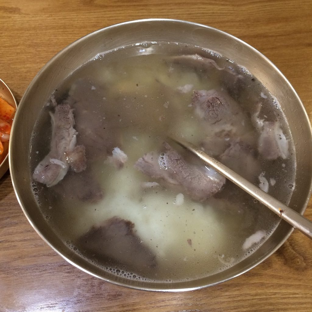 A bowl of gomtang, clear Korean beef bone soup