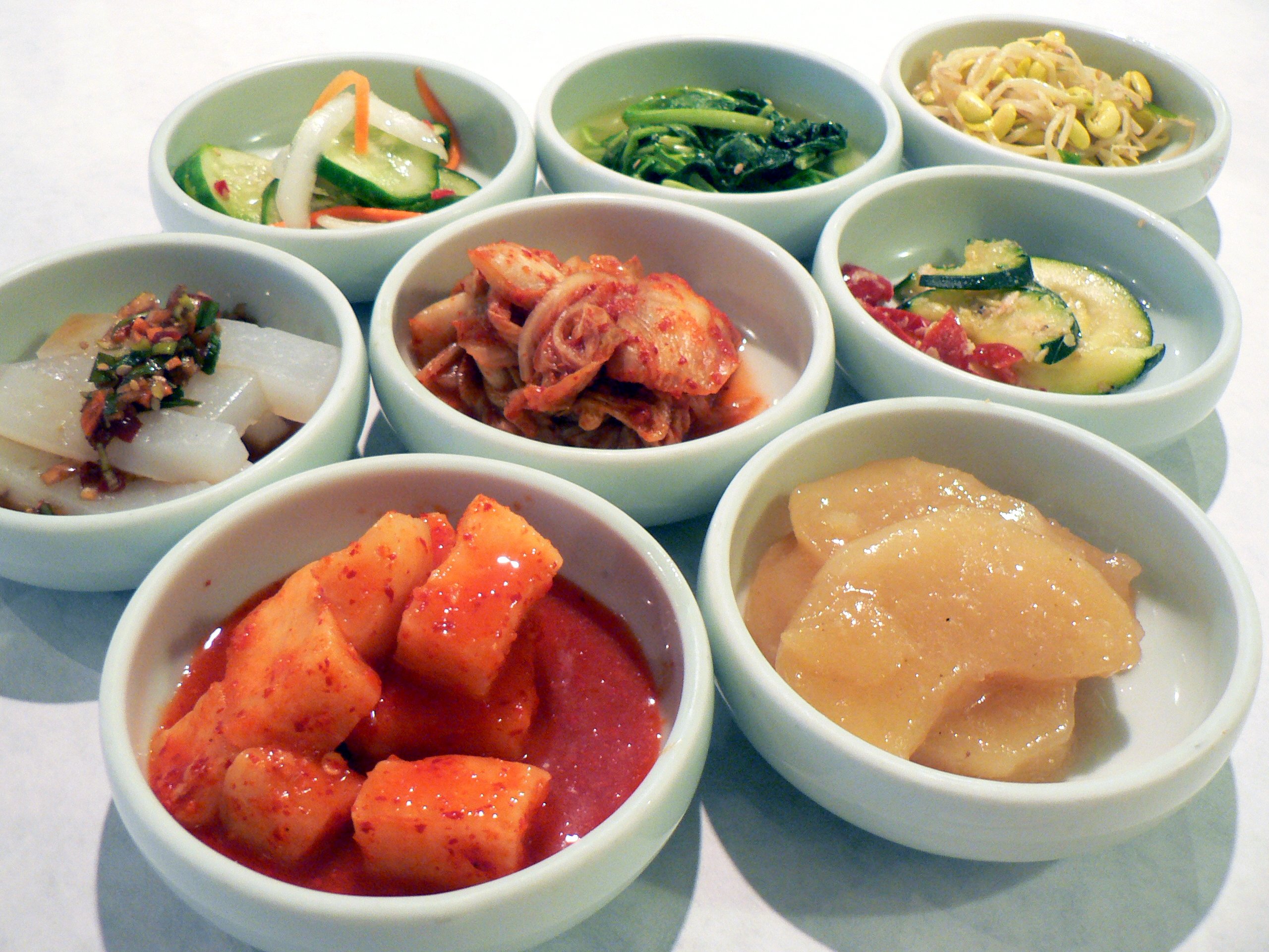Free Korean side dishes (banchan) on a restaurant table
