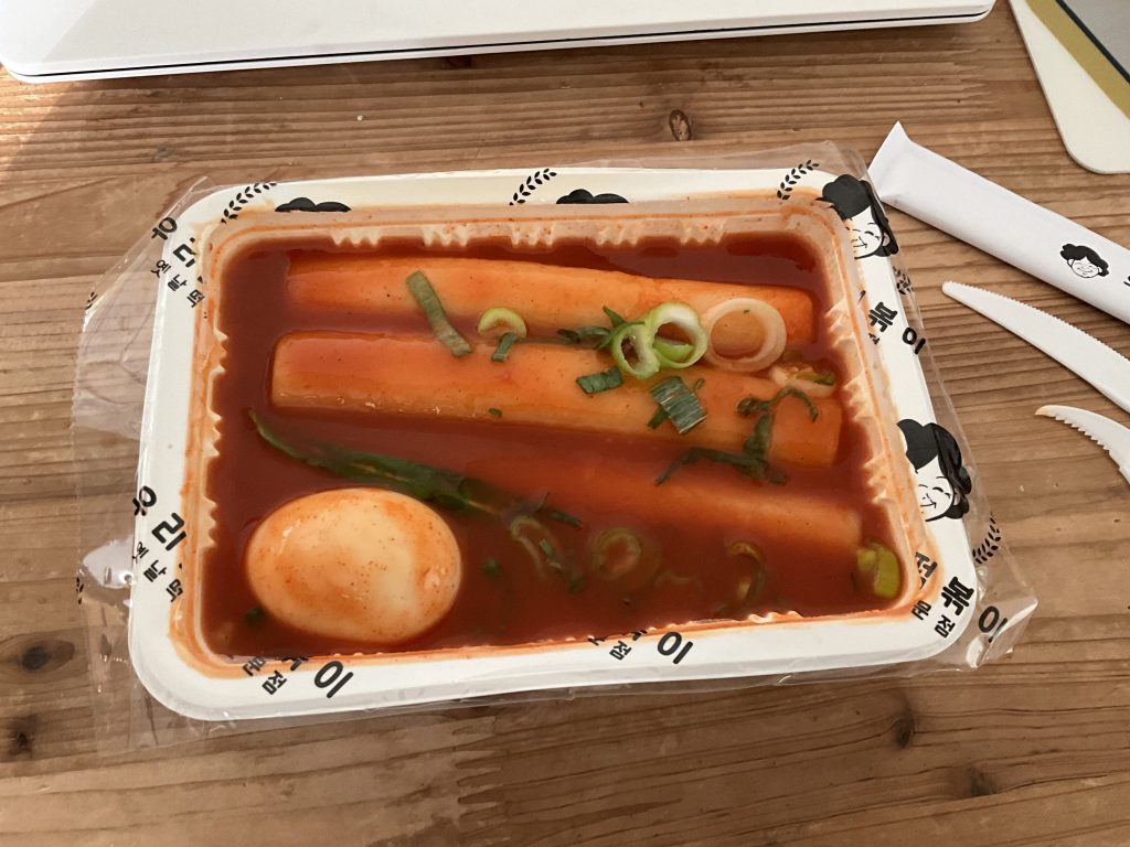 Tteokbokki, chewy rice cakes in sweet-spicy gochujang sauce, the base of Mark Jeongsik