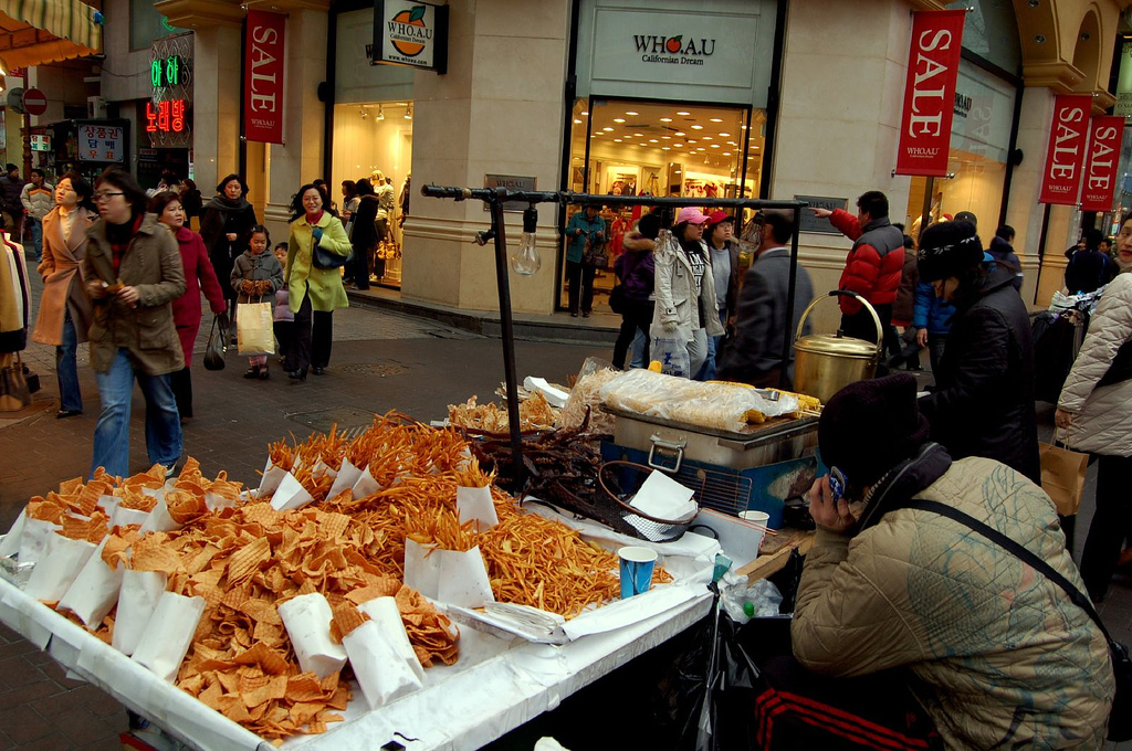 Evening crowds and street food stalls in Myeongdong, Seoul