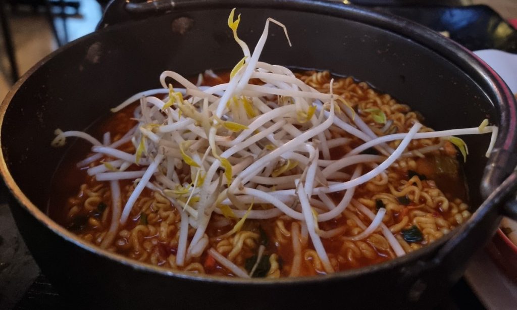 Pot of ramyeon topped with bean sprouts at Sob&Co pub, Bundang